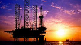 IEA, küresel petrol talebi için artış tahminini düşürdü